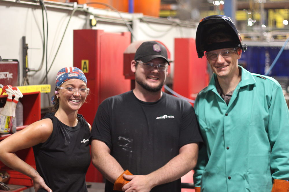 group photo with welders