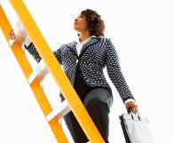 business woman on ladder